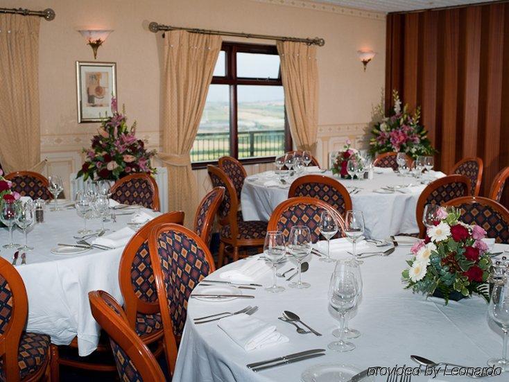 滨海索尔特本 Hunley Golf Club酒店 餐厅 照片